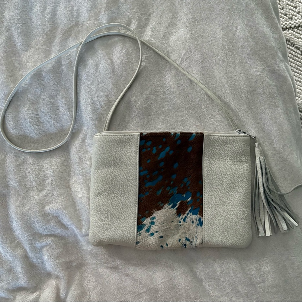 Col de‎ Mar leather cowhide crossbody bag with turquoise patches.